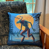 Our wendigo throw pillow on a chair