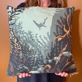 A lady holding our channel islands pillow