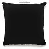 Black back of throw pillows