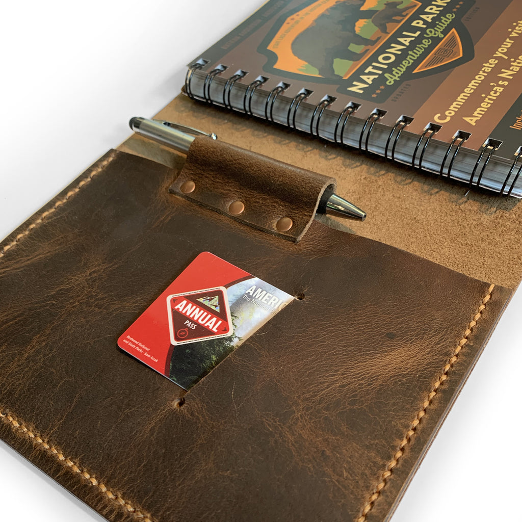 Deluxe Leather Cover with NP Adventure Guide Book Inside - Anderson Design  Group